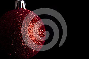 Red christmas ball on white background