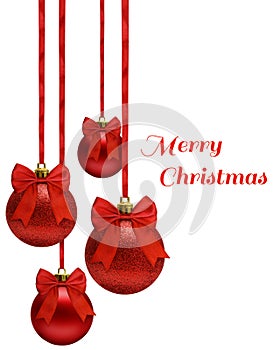 Red christmas balls hanging on ribbon bow, over white