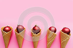 Red Christmas baubles in ice cream cones