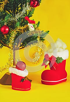 Red Christmas boot with gift on background