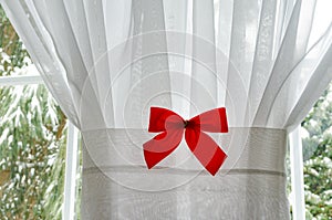Red Christmas Bow on White Window Curtain 2