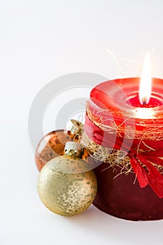 Red Christmas candle and Christmas ornaments