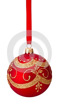 Red Christmas decoration bauble hanging on ribbon Isolated on white background