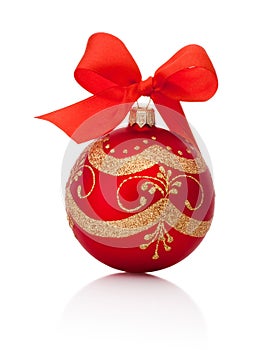 Red Christmas decoration bauble with ribbon bow isolated on white background
