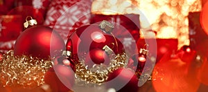 Red christmas decoration gifts and christmas tree deco.