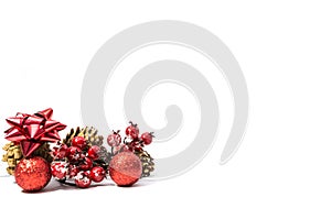 Red Christmas decoration, pine cone , frozen rose hips, red balls isolated on white background