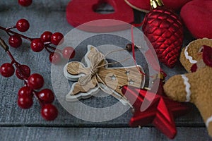 Red Christmas decorations on dark wood surface, Christmas decorations for Christmas tree