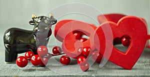 Red Christmas decorations on dark wood surface, Christmas decorations for Christmas tree