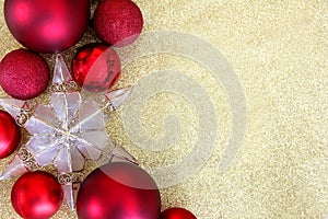 Red Christmas Decorations and Star Border Gold Background