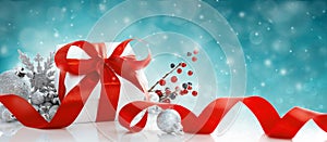 Red Christmas gift box and baubles on blue background