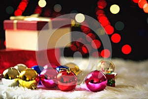 Red Christmas gift box and bokeh on background