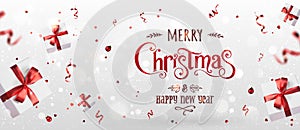 Red Christmas and New Year Text on Xmas background with flying gift boxes, red ribbon, decoration, sparkles, confetti, bokeh.