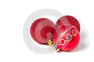 Red Christmas ornaments ball on white.