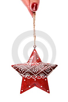 Red christmas tree decor in form of star with ornament