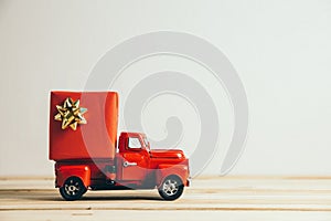 Red Christmas truck and gift. Merry Christmas and happy new year concept