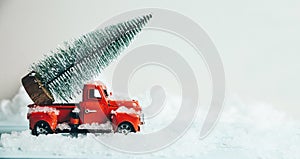 Red Christmas truck with pine tree and gift. Merry Christmas and happy new year concept