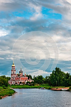 Red church with beautiful cloudscape