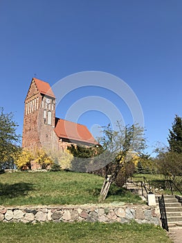 Red church on a hill in Poland, Slawsko