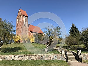 Red church on a hill in Poland, Slawsko