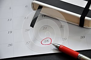 Red Circle Marked on Date 28