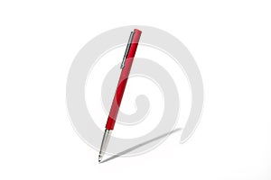 Red classic ballpoint pen writing