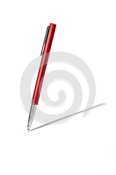 Red classic ballpoint pen writing