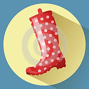 Red classic gumboot with white dots pattern