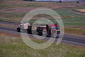 Red Classic Semi-Truck / Loaded Flatbed photo