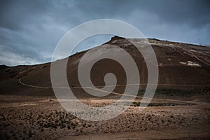 Red clay hill in the geothermal area Hverir, Iceland in summer. Myvatn region,