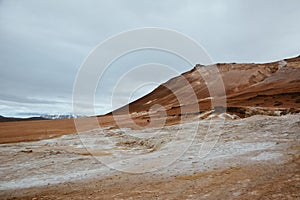 Red clay hill in the geothermal area Hverir, Iceland in summer. Myvatn region, North part of Iceland