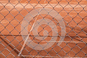 Red clay tennis court surface