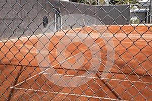 Red clay tennis court surface