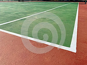 red clay tennis green court net lines play ball playing score scoring line bounds corner