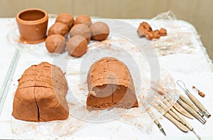 Red clay and tools, prepared for students