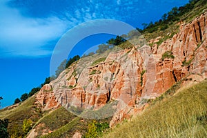 Red clays with dinosaur fossils. Geological reserve photo
