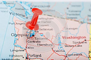 Red clerical needle on map of USA, Washington and DC. Close up map of Washington with red tack
