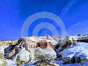 Red cliffs on blue skies.