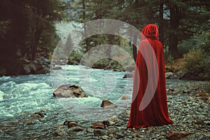 Red cloaked person