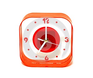 Red clock isolated on white background