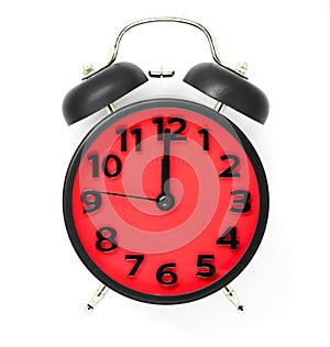 Red clock pointing at midday or midnight on white.