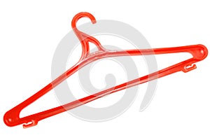 Red clothes hanger. Isolated