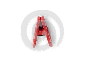 Red clothspin or clothes pegs isolated on white