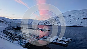 Red Cloud Reflecting In The Water In Akkarfjord