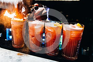 Red cocktail in a glass.