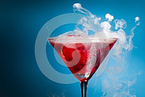 Red cocktail with ice vapor