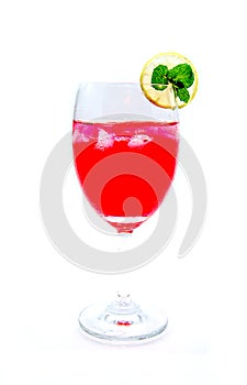 Red cocktail and lime slice isolated on white