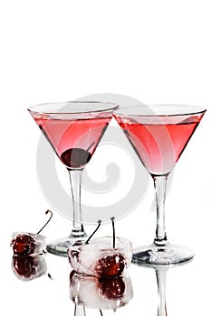 Red cocktail in martini glasses