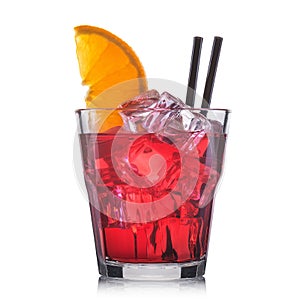 Red cocktail in old fashioned cocktail glass isolated on white background