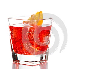 Red cocktail with orange slice isolated on white background