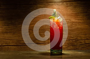 Red Coctail with romero in lighting space